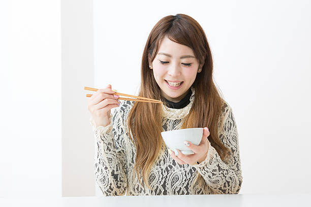 istock Japanese woman with bowl 620742370