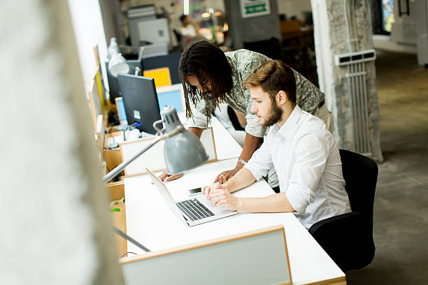 istock Young people in the office 620743160