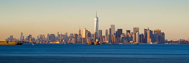 istock Lower Manhattan Panoramic Sunset from New York City Harbor 620743638