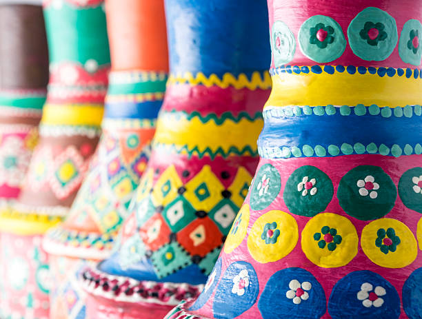 istock Composition of artistic painted clorful handcrafted pottery vases 620744454