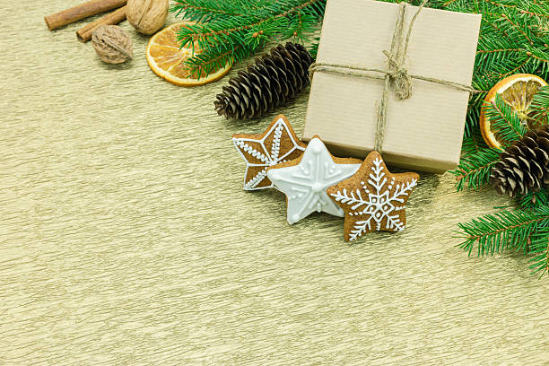 istock christmas gift box with gingerbread cookies with spices 620951356