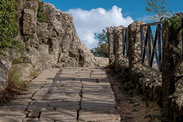 istock San Marino, Italy. Stone road between the forts. 620951734