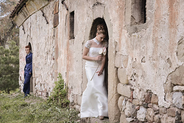istock Beautiful bride and groom outdoors 620952264