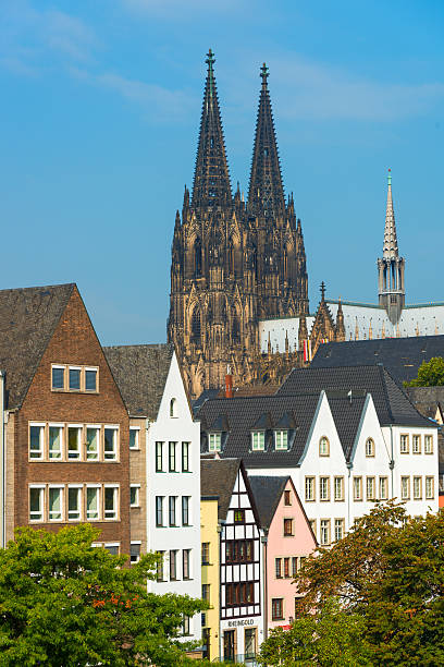 istock colorful houses in Cologne with Cathedral 620953430