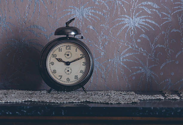 istock Vintage winding clock. Old times. 620953606