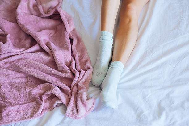 istock Women leg in bad 620954468