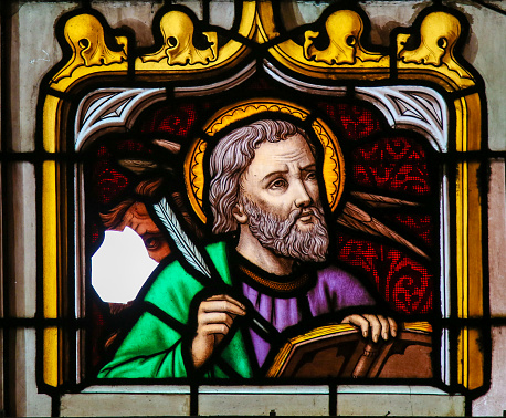Mechelen, Belgium - November 4, 2016: Stained Glass window depicting Saint Mark the Evangelist, in the Cathedral of Saint Rumbold in Mechelen, Belgium.