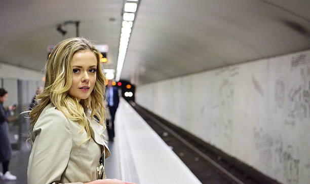 istock Blonde Swedish woman, commuter subway train 620954556