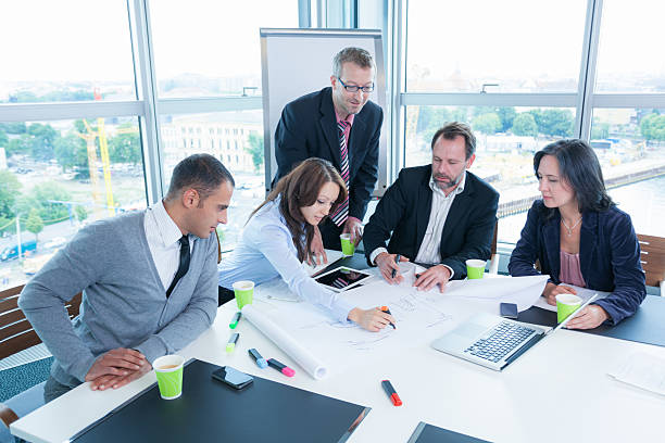 istock german business people in office 620955484
