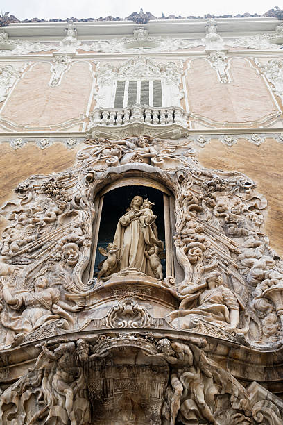 Valencia, Spain - July 14, 2016: Valencia (Spain), facade of the Palace of Marques de Dos Aguas. A statue
