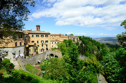 Italy, homes in traditional structure in Etruscan village Volterra