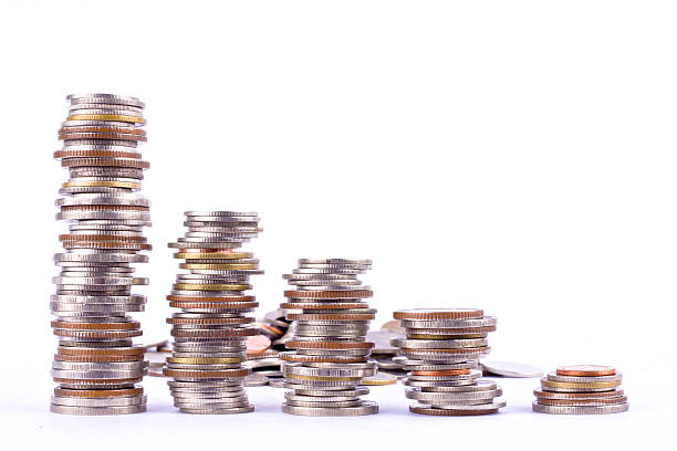 istock money growing  bath coins stack on white background finance business 620963296