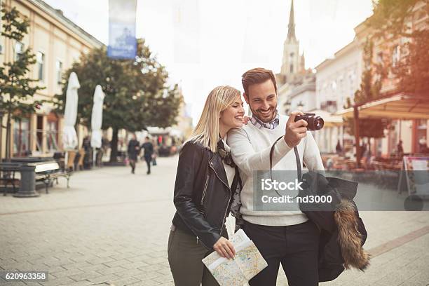 Tourist Couple Enjoying Sightseeing Stock Photo - Download Image Now - City, Couple - Relationship, Exploration