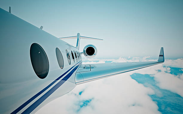 istock Closeup of realistic photo white, luxury generic design private jet 620965802