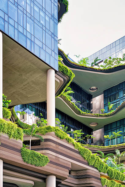 Singapore, Singapore - March 1, 2016: Modern architecture of a balcony of the building with much green plants. Modern design in the center of Singapore.