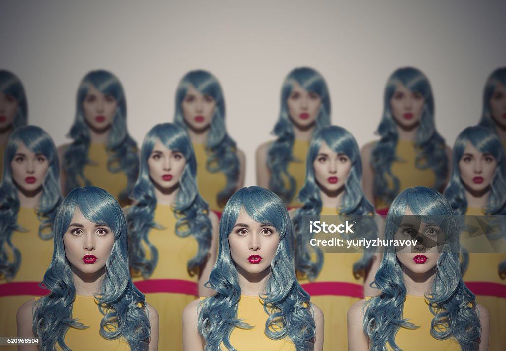 Many Glamour Beauty Woman Clones. Identical Crowd Concept. Many Glamour Beauty Woman Clones. Identical Crowd Concept. On Gray Background. Repetition Stock Photo