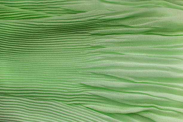 istock Pleated fabric background texture. pattern of fabric in the crea 620970534