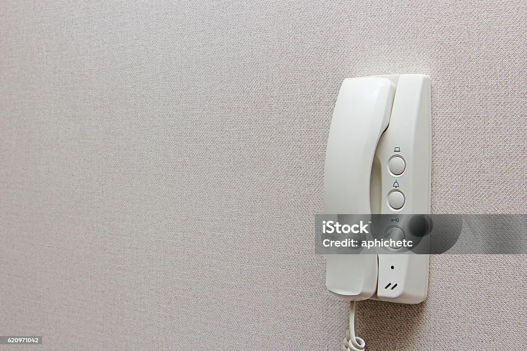 Intercom White White Intercom On A Wall Stock Photo - Download Image Now ...