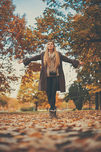 istock Beautiful girl in park 620971084