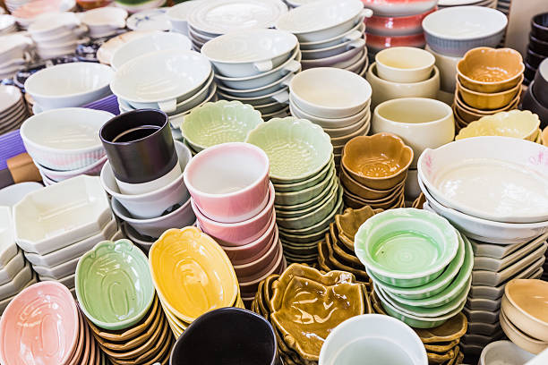 istock piles of colorful ceramic bowls. 620971110