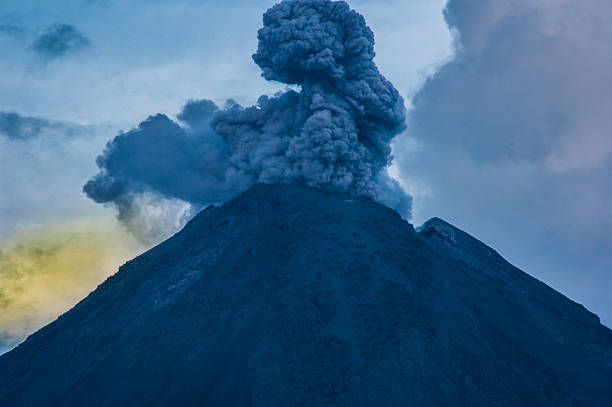 istock Ashes and smoke erupting from the crater 620971842