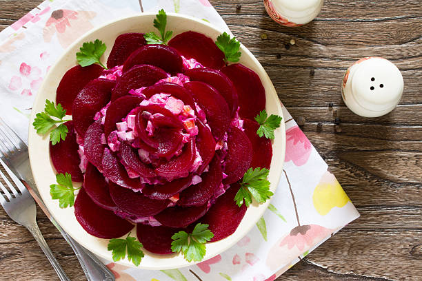 istock salad an appetizer in the form of rose 620972932
