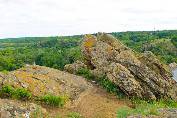 istock Summer landscape with trees, hills and rocks 620973056