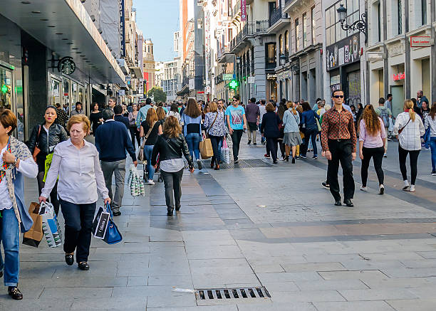 Madrid Madrid, Spain - October 30, 2016: People in Preciados Street in Madrid. This is the more commercial street of the Spain capital high street shops stock pictures, royalty-free photos & images