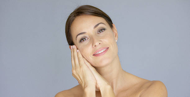 istock Young adult female with head resting on hands 620977220