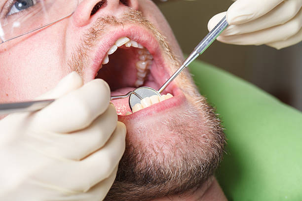 istock dentistry, patient examination and treatment at the dentist 620977800