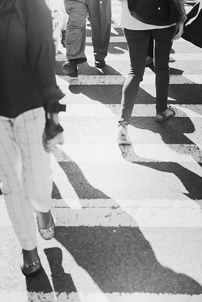 People Crossing at Broadway/5th Avenue in New York