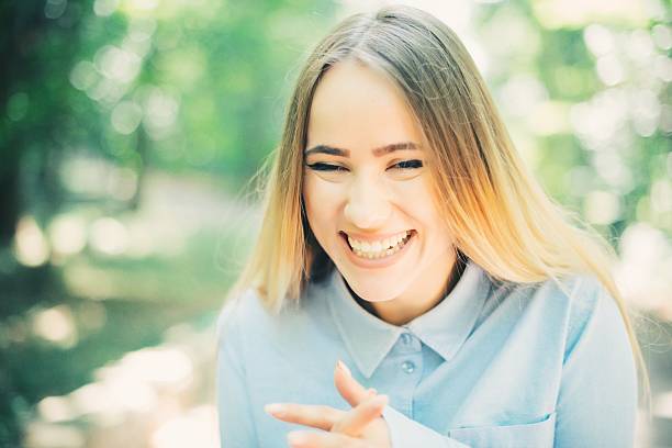 istock happy beautiful young woman 620980616