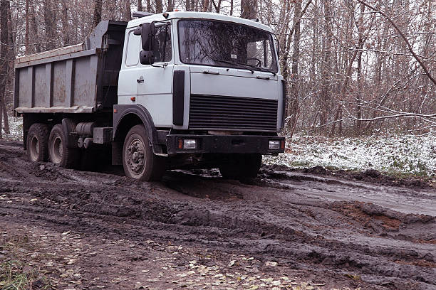 istock Truck on the dirty road 620983396
