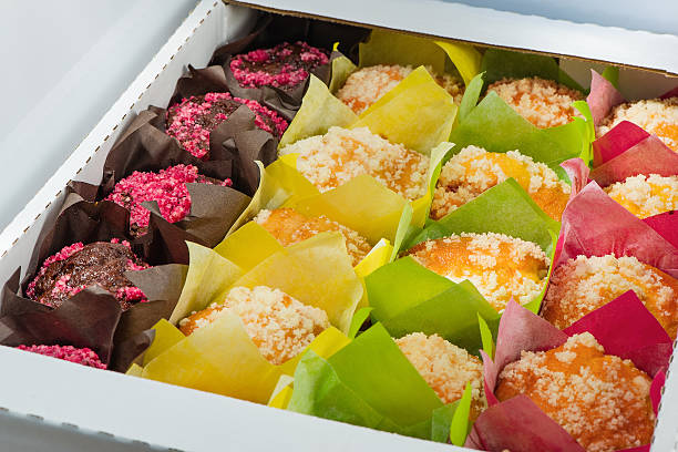 istock The muffins of different color packed into  paper 620985662