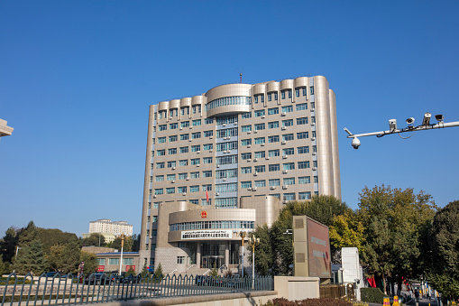Urumqi, Xinjiang, China- October 10, 2016: Street view of government building at Urumqi. The building is protected around.