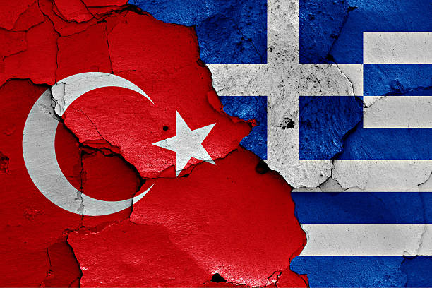 istock flags of Turkey and Greece painted on cracked wall 620988876