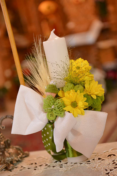 istock Candle decorated for a child orthodoxy or wedding 620990974