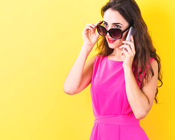 istock Young woman talking on the phone 620991468