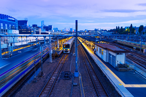 railway station with busy traffic at night in TOKYO