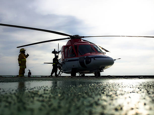 istock Helicopter on an oil platform being refueled 620994954