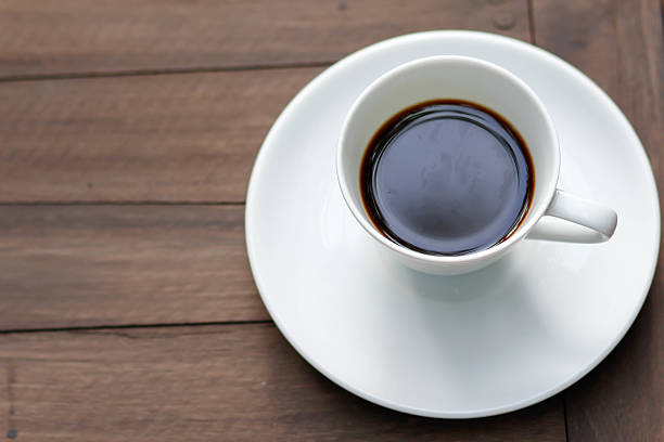 istock cup of coffee on the wooden table 620996114