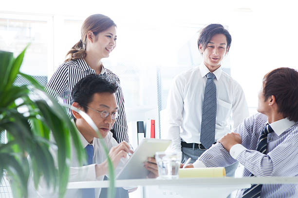 istock People who have a conference for the company's growth 620997888