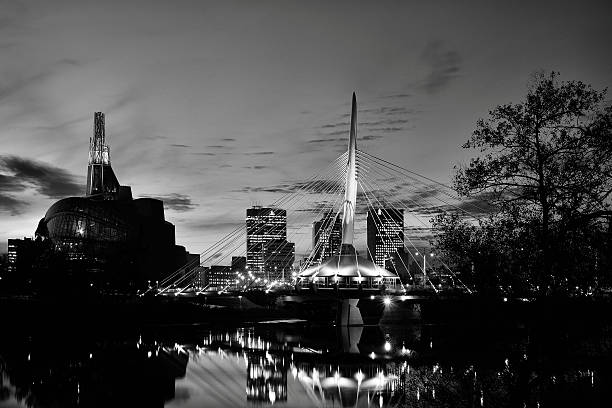 Winnipeg Skyline Image featuring the skyline from Winnipeg, Manitoba.  Monochrome image. manitoba photos stock pictures, royalty-free photos & images