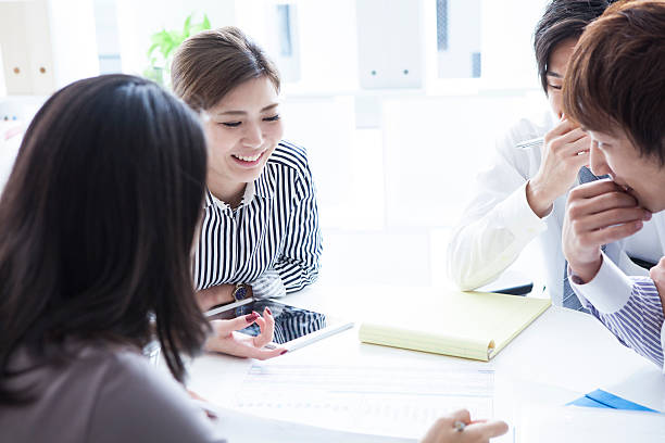 istock Businesswoman laughing during a meeting 621100162
