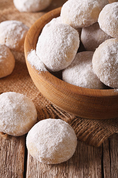istock Shortbread cookies with nuts macro in a bowl. Vertical 621106262