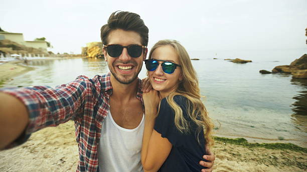 istock Beautiful couple taking a selfie. 621109620