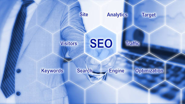 istock IT expert touches grid with seo keywords 621110314