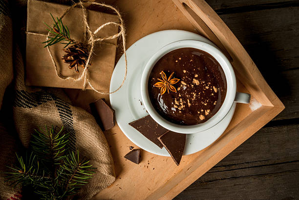 istock Hot chocolate mug and christmas present 621111086