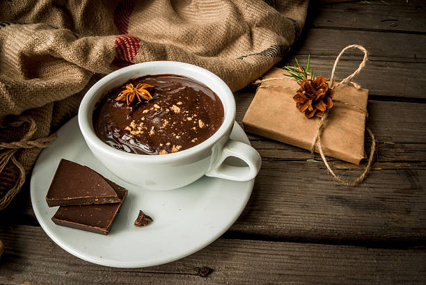 istock Hot chocolate mug and christmas present 621111148