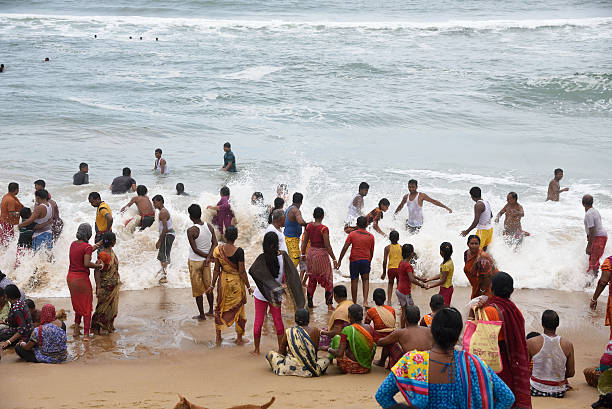 istock crowded sea beach Orissa, India 621113546